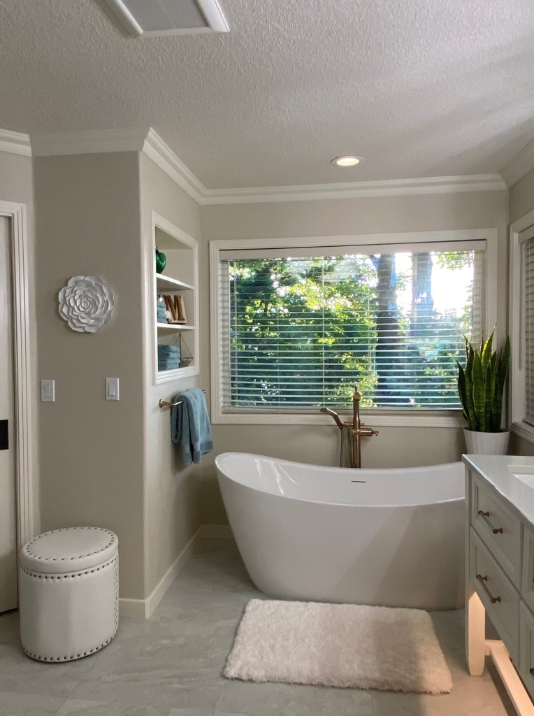 vessel tub with gold fixtures